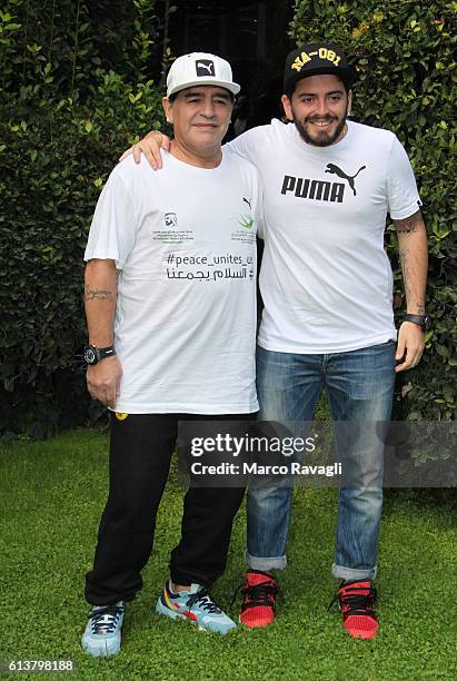 Argentinian soccer legend Diego Armando Maradona with his son Diego Armando Maradona Junior poses during the photocall for the presentation of the...
