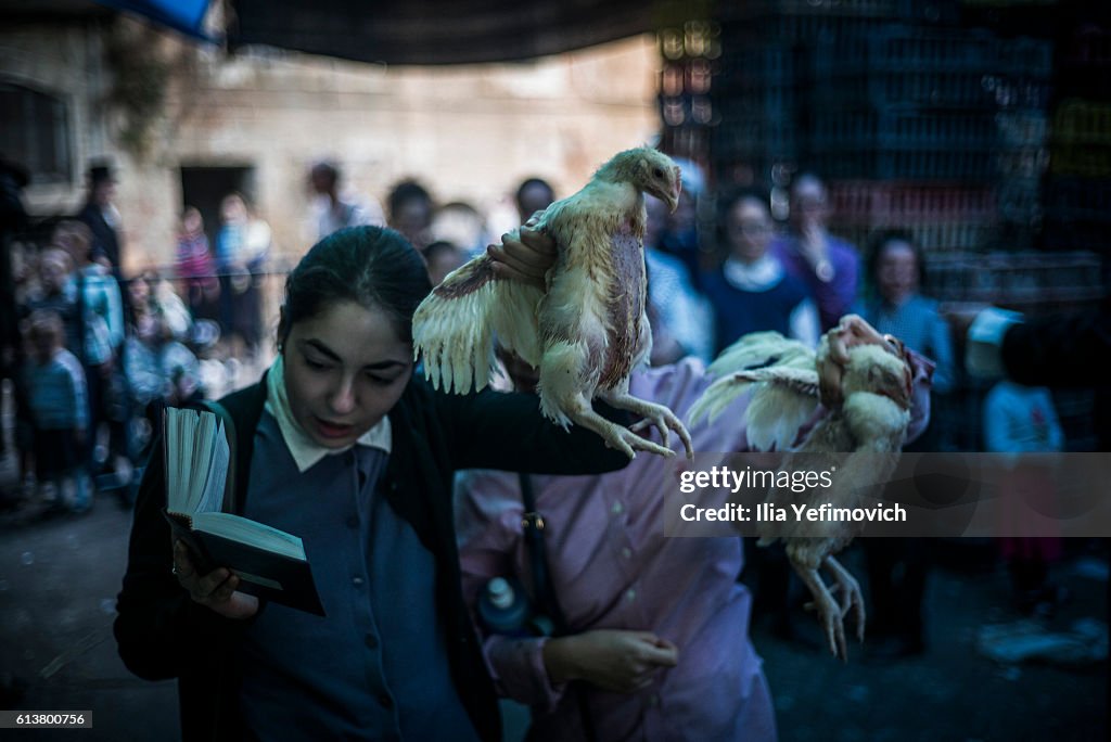 Kaparot Ritual Ultra-Orthodox Jewish girls perform the Kaparot ceremony on October ...