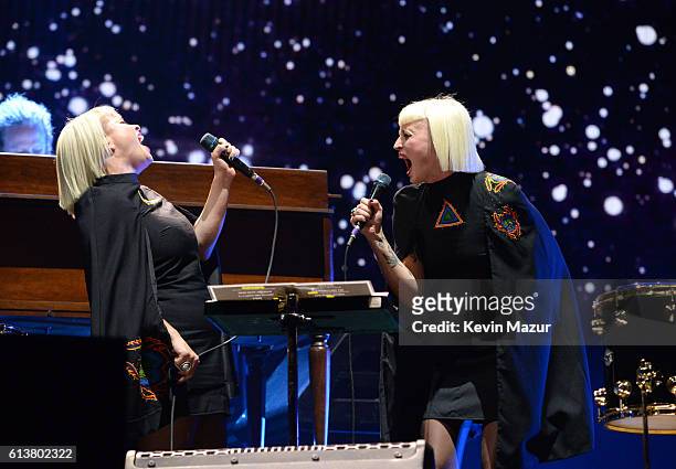 Singers Jess Wolfe and Holly Laessig perform with Roger Waters during Desert Trip at The Empire Polo Club on October 9, 2016 in Indio, California.