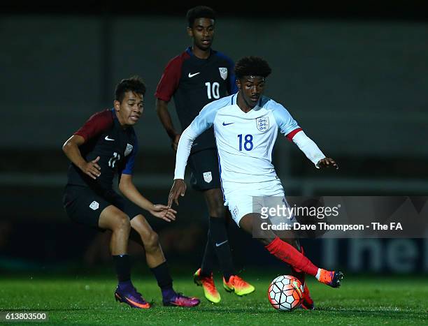 Ainsley Maitland-Niles of England U20 gets past Sebastian Saucedo of USA U20 and Gedion Zelalem of USA U20 during the Under 20's Four Nations...