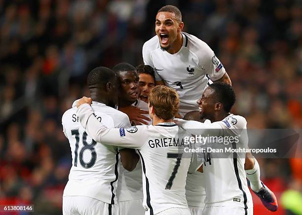 Paul Pogba of Francecelebrates scoring his teams first goal of the game with team mates during the FIFA 2018 World Cup Qualifier between Netherlands...