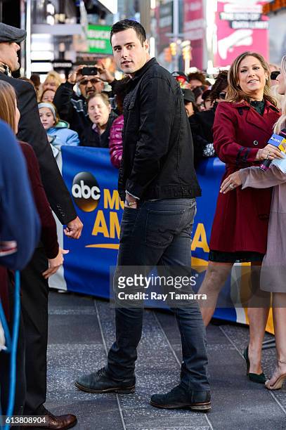 Television personality Ben Higgins leaves the "Good Morning America" taping at the ABC Times Square Studios on October 10, 2016 in New York City.