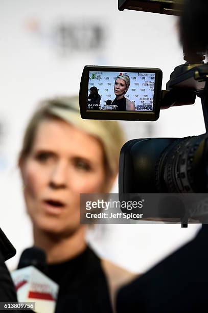 Actress Cynthia Nixon talks to a reporter as she attends the 'A Quiet Passion' official competition screening during the 60th BFI London Film...