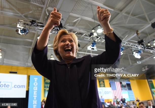 Democratic nominee Hillary Clinton gestures during a rally at Wayne State University in Detroit, Michigan October 10, 2016.