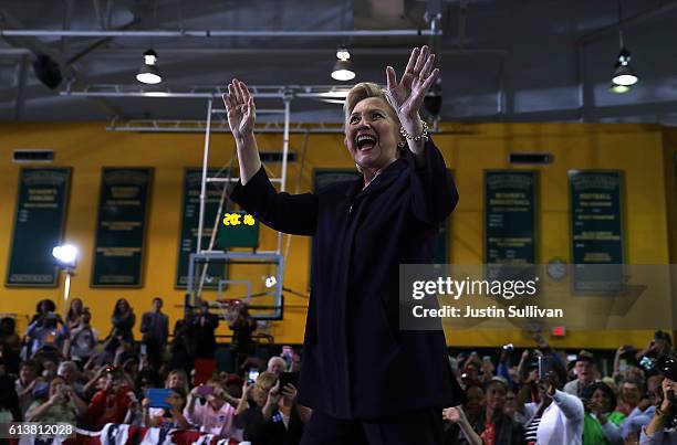 Democratic presidential nominee former Secretary of State Hillary Clinton greets supporters during a campaign rally at Wayne State University on...