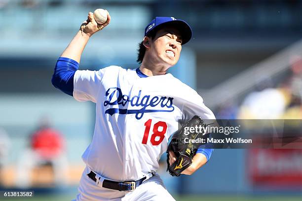 Kenta Maeda of the Los Angeles Dodgers pitches in the first inning against the Washington Nationals in game three of the National League Division...