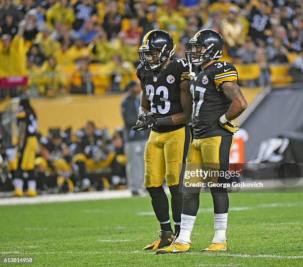 Safety Mike Mitchell and safety Jordan Dangerfield of the Pittsburgh Steelers look on from the field during a game against the Kansas City Chiefs at...