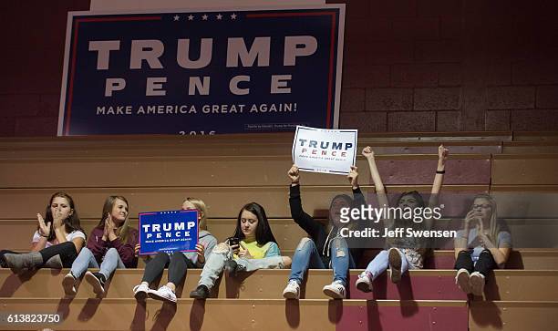 Group of teenagers listen to Republican candidate for President Donald J Trump speak to supporters at a rally at Ambridge Area Senior High School on...