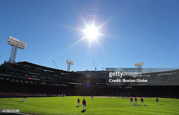 Boston Red Sox players taking batting practice before Game Three of the American League Division series between the Boston Red Sox and the Cleveland...