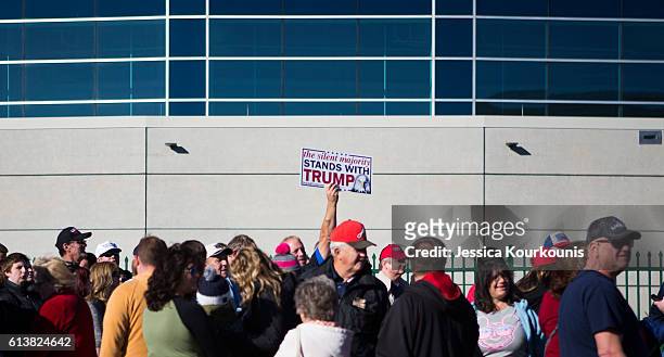 Supporters line up for a campaign rally with Republican presidential nominee Donald Trump at Mohegan Sun Arena on October 10, 2016 in Wilkes-Barre,...