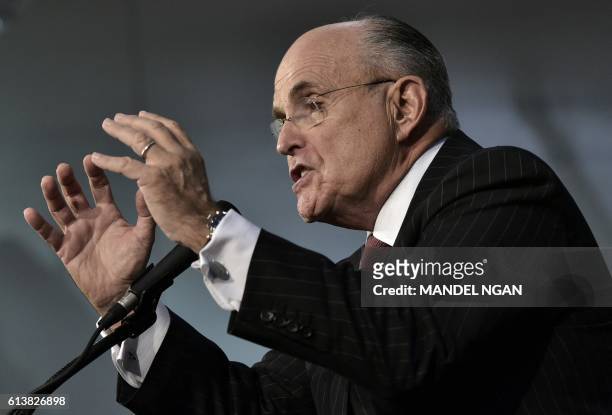 Former New York City mayor Rudy Giuliani speaks at a rally for Republican presidential nominee Donald Trump at Ambridge Area Senior High School on...