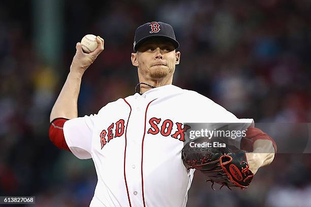 Clay Buchholz of the Boston Red Sox throws a pitch in the first inning against the Cleveland Indians during game three of the American League Divison...