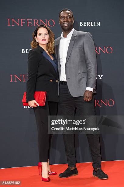 Helene Sy and Omar Sy attends the German premiere of the film 'INFERNO' at Sony Centre on October 10, 2016 in Berlin, Germany.