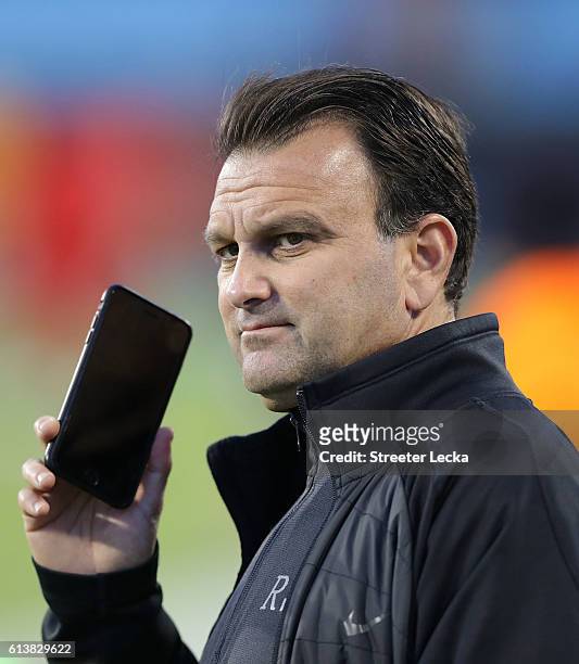 Sports agent Drew Rosenhaus watches on ahead of the game between the Tampa Bay Buccaneers and the Carolina Panthers at Bank of America Stadium on...