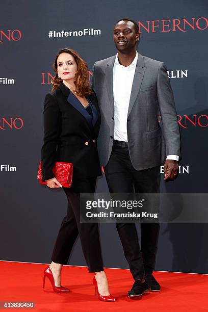 Actor Omar Sy and his wife Helene Sy attend the German premiere of the film 'INFERNO' at Sony Centre on October 10, 2016 in Berlin, Germany.