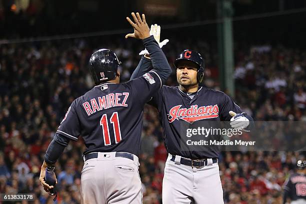 Coco Crisp of the Cleveland Indians celebrates with Jose Ramirez after hitting a two-run home run in the sixth inning against the Boston Red Sox...