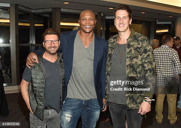 Former NFL player Eddie George, and Russell Dickerson attend the APA IEBA Reception on October 10, 2016 in Nashville, Tennessee.