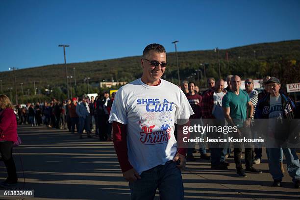 Supporters line up outside for a campaign rally for Republican presidential nominee Donald Trump on October 10, 2016 in Wilkes-Barre, Pennsylvania....