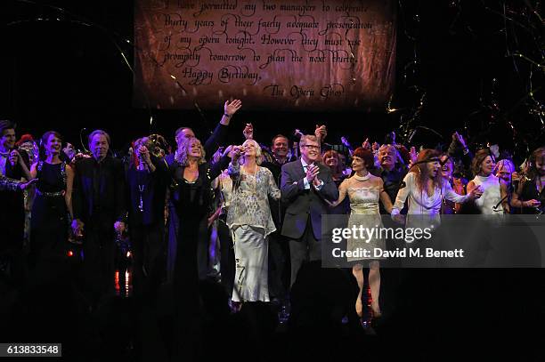 Michael Crawford bows onstage surrounded by members of the original London cast at "The Phantom Of The Opera" 30th anniversary charity gala...