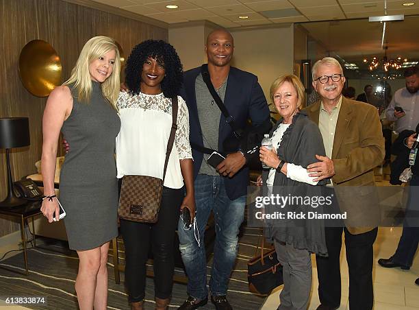 S Lisa Cook, Tamara Johnson-George "Taj" of SWV, former NFL player Eddie George, Mary-Anne Shelide and APA's Ray Shelide attend the APA IEBA...