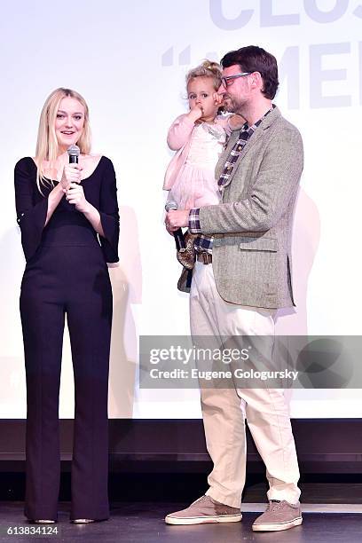 Dakota Fanning, Plum Nugent and David Nugent, HIFF Artistic Director, appear onstage at the American Pastoral screening during the Hamptons...