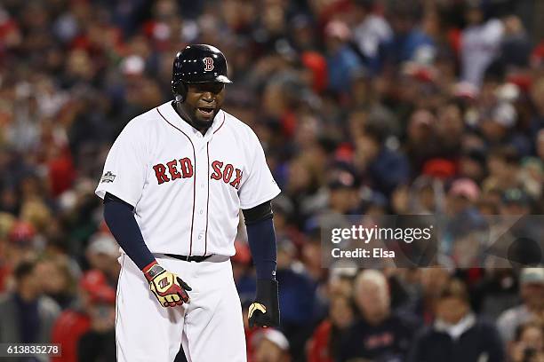 David Ortiz of the Boston Red Sox reacts in the eighth inning against the Cleveland Indians during game three of the American League Divison Series...