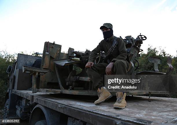 Members of opponent groups attack Assad Regime's bases located at a hill on the border between Latakia and Idlib in Syria on October 10, 2016.