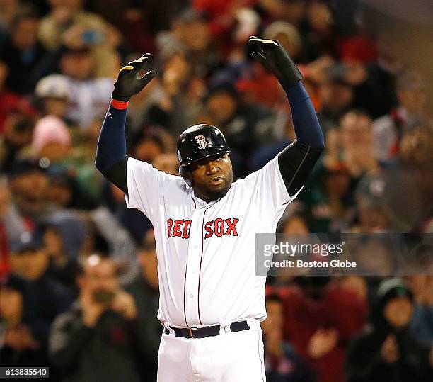 Boston Red Sox designated hitter David Ortiz signals the crowd to get rowdy in the eighth inning. The Boston Red Sox host the Cleveland Indians in...