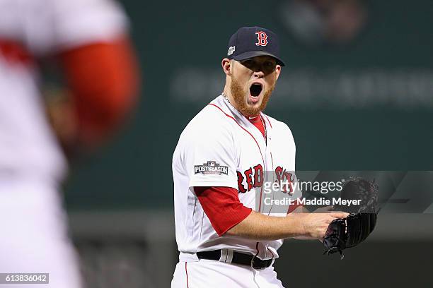 Craig Kimbrel of the Boston Red Sox reacts after the third out in the ninth inning against the Cleveland Indians during game three of the American...