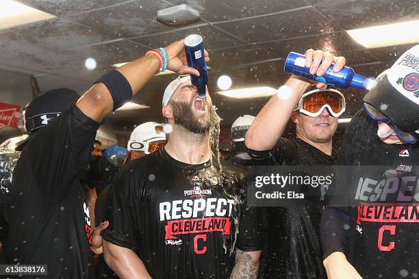 Mike Napoli of the Cleveland Indians celebrates after defeating the Boston Red Sox 4-3 in game three of the American League Divison Series to advance...