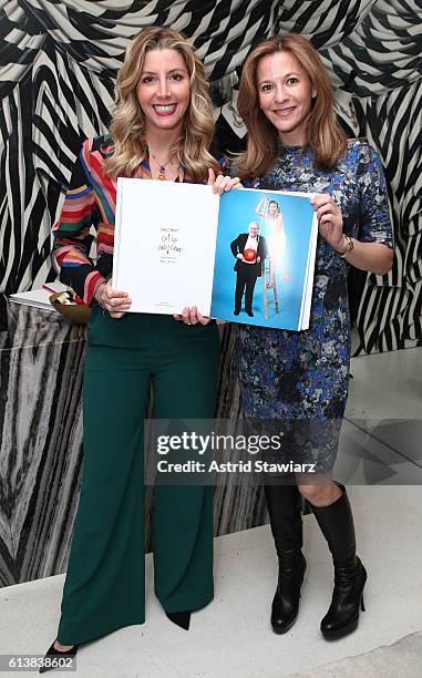 Sara Blakely and Gillian Zoe Segal pose for a photo together as Blakely and Alice + Olivia celebrate the launch of "The Belly Art Project" on October...