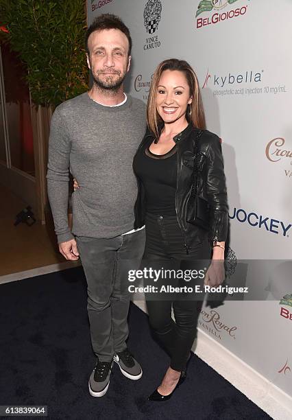 Larry Rudolph and guest attend MEN'S FITNESS Celebrates the 2016 GAME CHANGERS at Sunset Tower Hotel on October 10, 2016 in West Hollywood,...