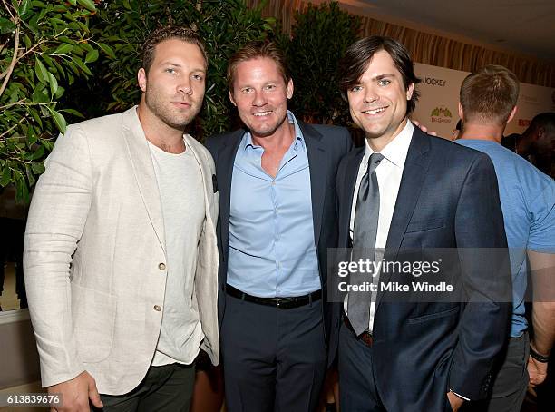 Actor Jai Courtney, editorial director at Men's Fitness David Zinczenko and executive editor at Men's Fitness Keenan Mayo attend MEN'S FITNESS...