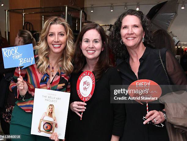 Sara Blakely , Leah Friedman and Bridgette Cunniff pose for a photo as Blakely and Alice + Olivia celebrate the launch of "The Belly Art Project" on...