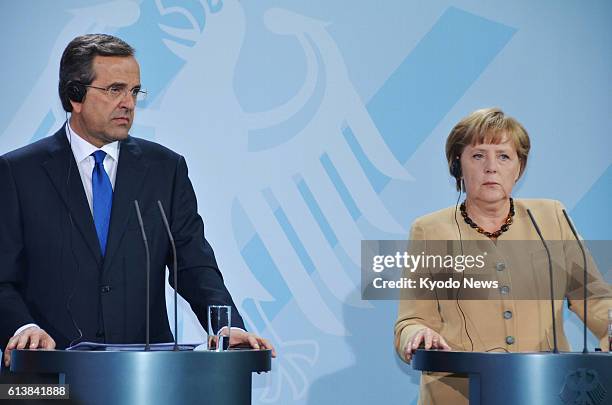 Germany - German Chancellor Angela Merkel and Greek Prime Minister Antonis Samaras hold a news conference in Berlin on Aug. 24 after their first...