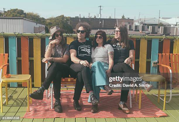 Peter Holmstrom, Brent DeBoer, Zia McCabe, and Courtney Taylor-Taylor of The Dandy Warhols pose before their performance at Saturn Birmingham on...