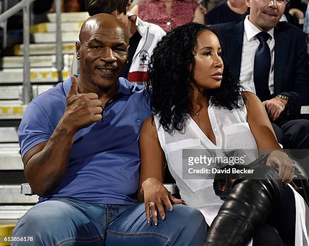 Former boxer Mike Tyson and his wife, Lakiha "Kiki" Tyson attend the World TeamTennis Smash Hits charity tennis event benefiting the Elton John AIDS...