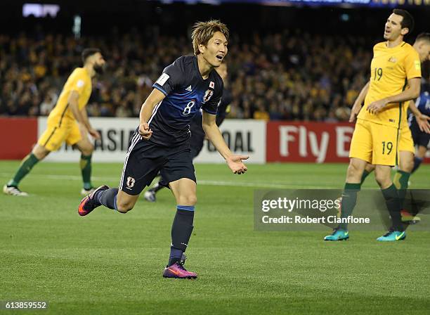 Genki Haraguchi of Japan celebrates after scoring a goal during the 2018 FIFA World Cup Qualifier match between the Australian Socceroos and Japan at...