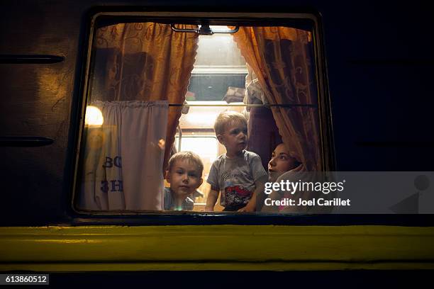 passengers on night train in lviv, ukraine - ukrainian culture stock pictures, royalty-free photos & images