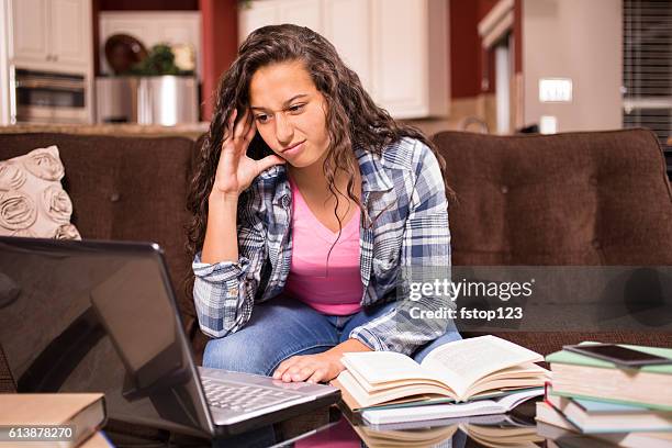 frustrated teenage girl studying or doing homework at home - one teenage girl only stock pictures, royalty-free photos & images