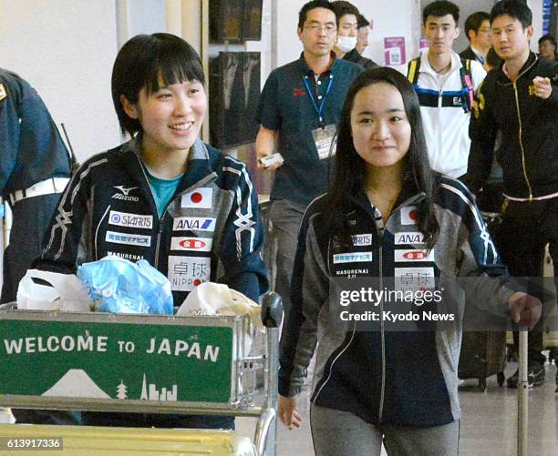 Miu Hirano , a 16-year-old Japanese table tennis player, arrives at Narita airport near Tokyo on Oct. 11 from Philadelphia, where she became the...