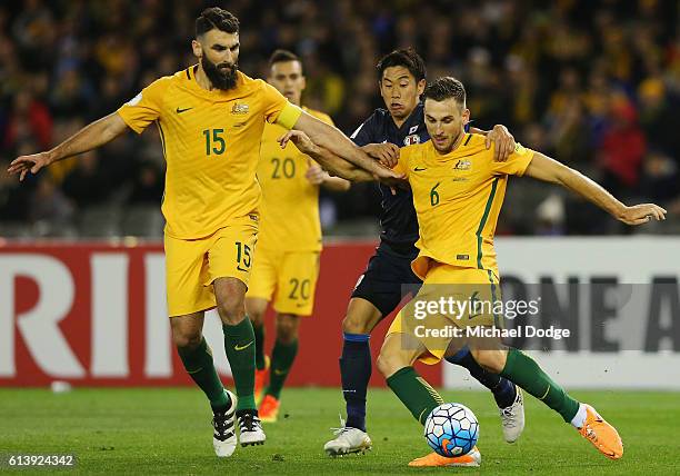 Matthew Spiranovic of the Socceroos competes for the ball during the 2018 FIFA World Cup Qualifier match between the Australian Socceroos and Japan...