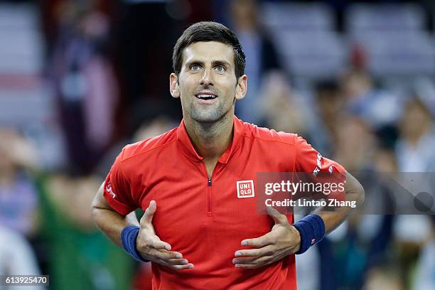 Novak Djokovic of Serbia celebrates after win over Fabio Fognini of Italy during the Men's singles first round match on day three of Shanghai Rolex...