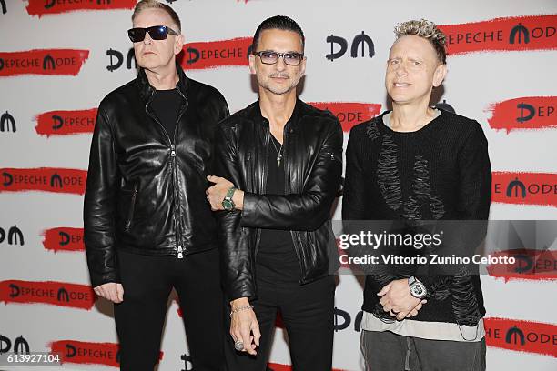 Depeche Mode attend a photocall to launch the Global Spirit Tour on October 11, 2016 in Milan, Italy.