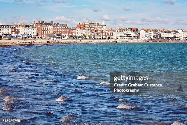 weymouth seafront - weymouth esplanade stock pictures, royalty-free photos & images