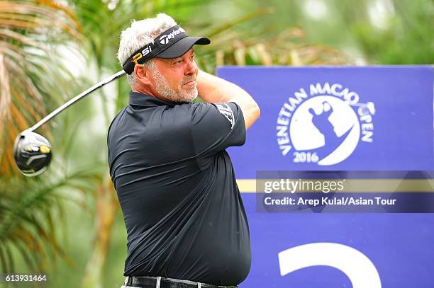 Darren Clarke of Northern Ireland plays a shot during practice for the 2016 Venetian Macao Open at Macau Golf and Country Club on October 11, 2016 in...