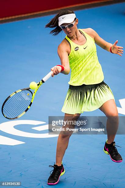 Saisai Zheng of China in action against Caroline Wozniacki of Denmark during the 2016 Hong Kong Open at Victoria Park on October 11, 2016 in Hong...