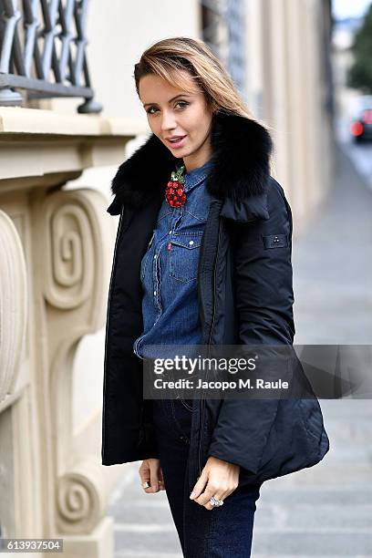 Nataly Osmann is seen wearing Peuterey "Felicity" jacket on October 9, 2016 in Florence, Italy.