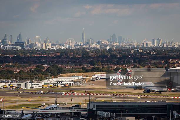 General view of aircraft at Heathrow Airport in front of the London skyline on October 11, 2016 in London, England. The UK government has said it...