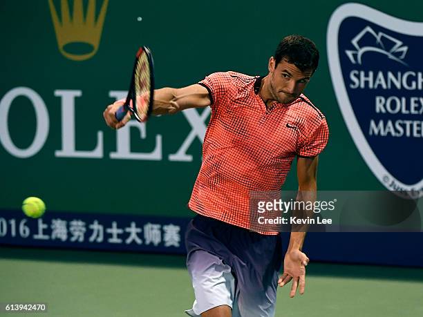 Grigor Dimitrov of Bulgaria returns a shot to Richard Gasquet of France during second round of ATP Shanghai Rolex Masters 2016 on Day 3 at Qi Zhong...